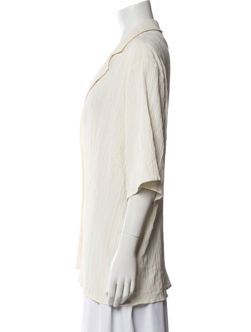 Dissh V-Neck Three-Quarter Sleeve Button-Up Top