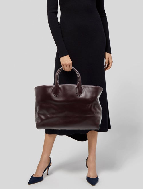 Flattered Leather Top Handle Bag