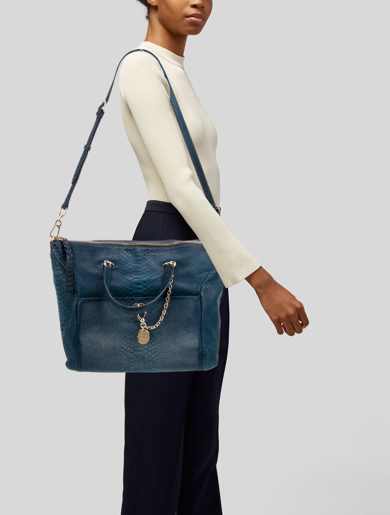 Henri Bendel Embossed Leather Weekender Bag