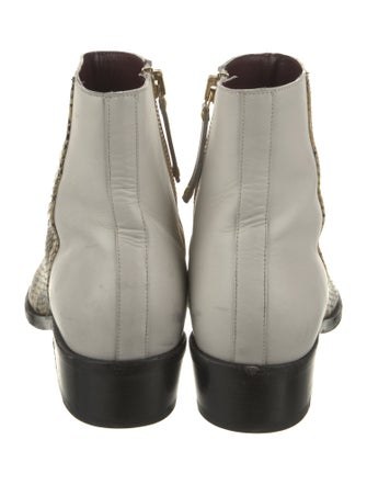 Human Recreational Services Leather Animal Print Boots