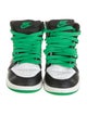 Jordan kid boys' green and black shoes