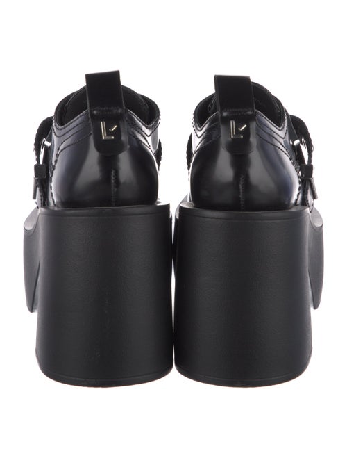 Larroude Patent Leather Pumps