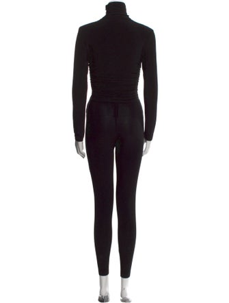 Norma Kamali Turtleneck Jumpsuit