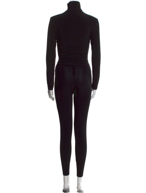 Norma Kamali Turtleneck Jumpsuit