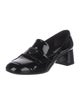 Prada Enameled Metal Triangle Patent Leather Pumps
