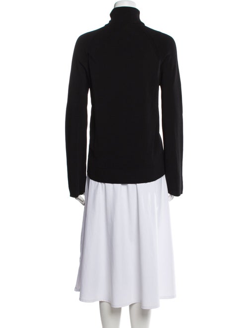 Simkhai Mock Neck Three-Quarter Sleeve Button-Up Top