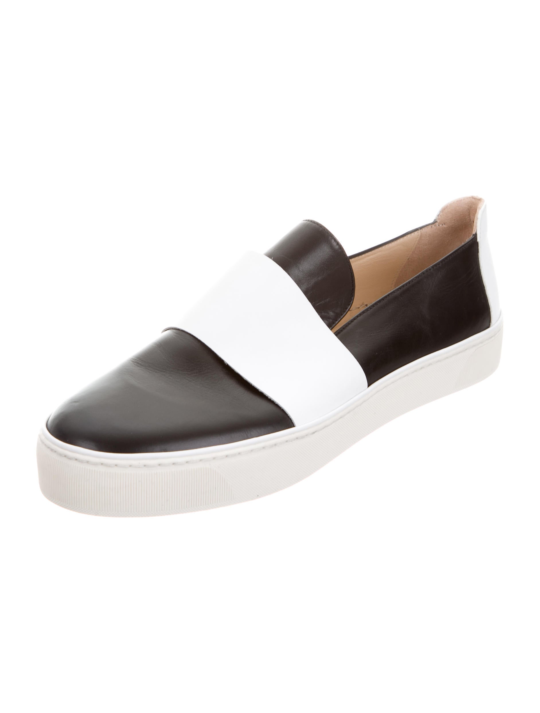 Leather slip on sneakers Free shipping BOTH ways on black leather slip on sneakers, from our vast selection of styles. Fast delivery, and 24/7/ real-person service with a smile. Click or call