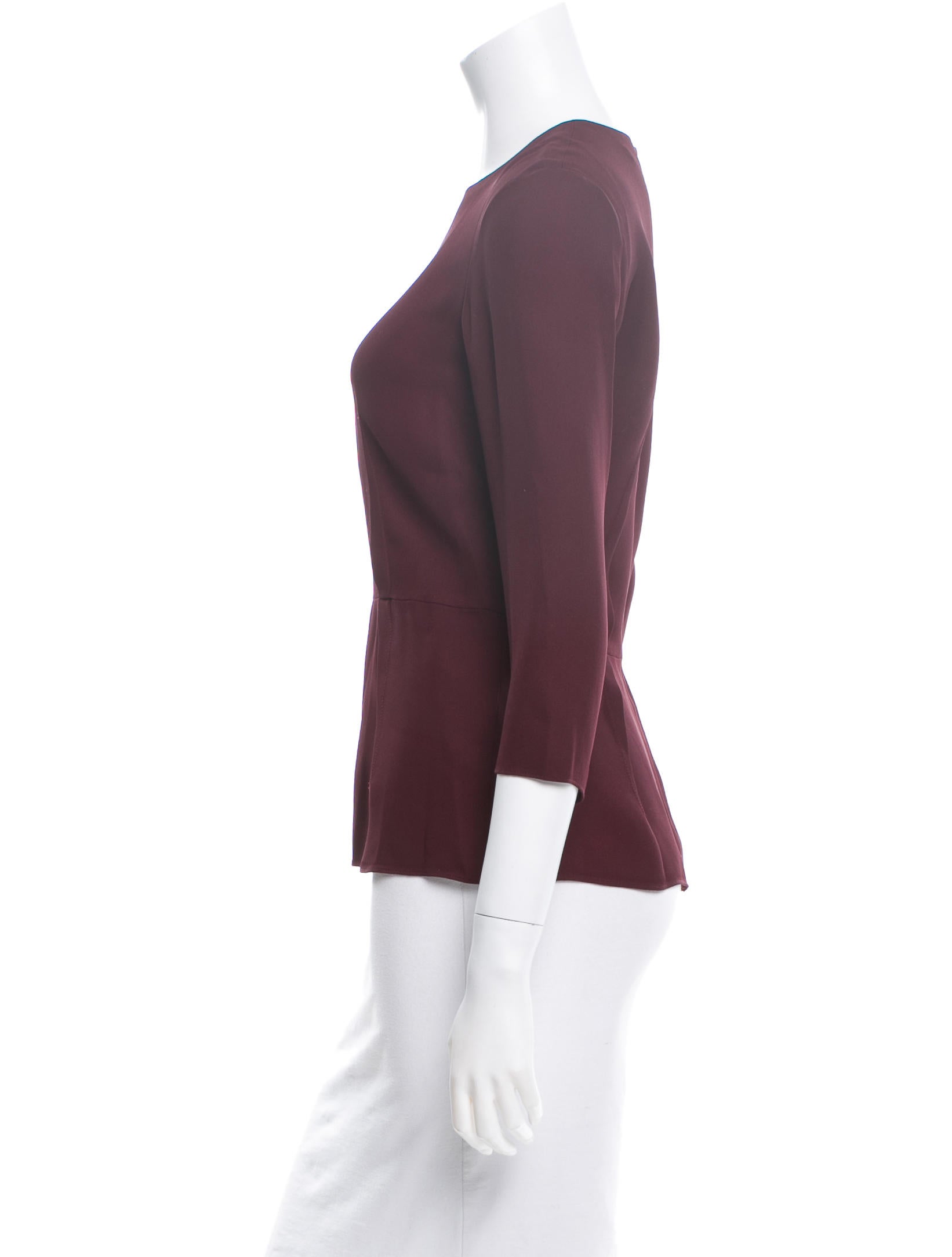 Shop by category Peplum top with a round neckline, three quarter sleeves, a button placket at the back and an attached matching inner. STYLE TIP: The soft peplum subtly enhances the waist and falls well on black jeggings for a fresh feminine appeal.