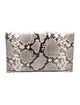 Tory Burch Embossed Leather Clutch