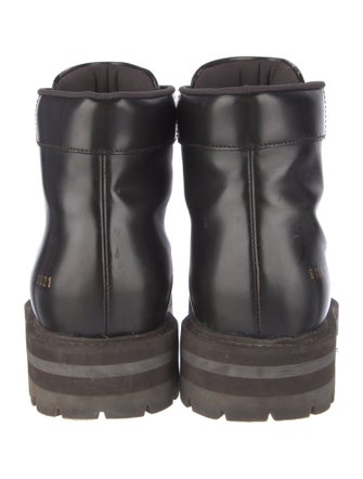 Woman by Common Projects Leather Combat Boots