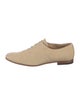 Woman by Common Projects Oxfords