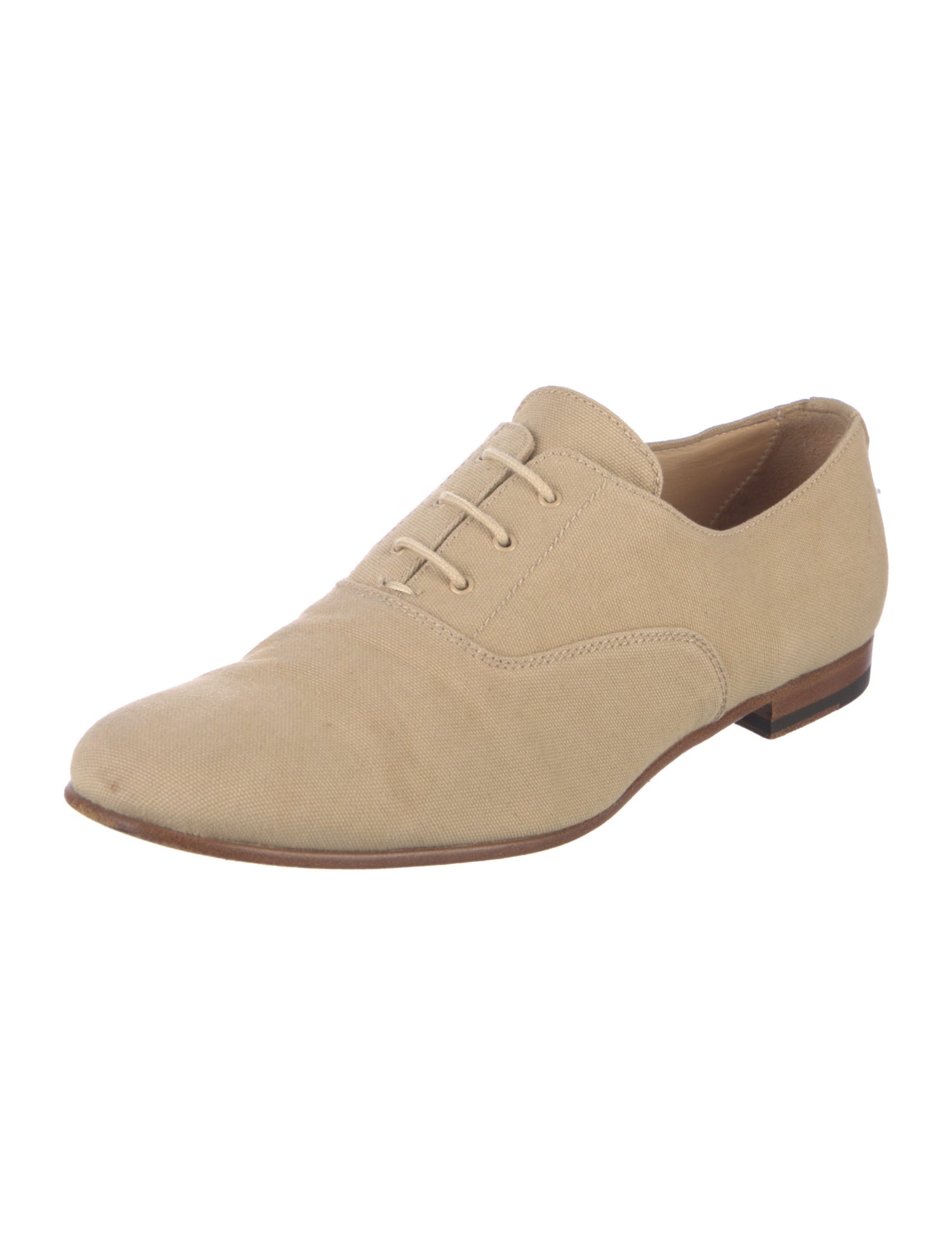 Woman by Common Projects Oxfords