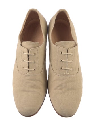 Woman by Common Projects Oxfords