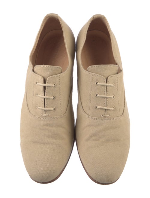 Woman by Common Projects Oxfords