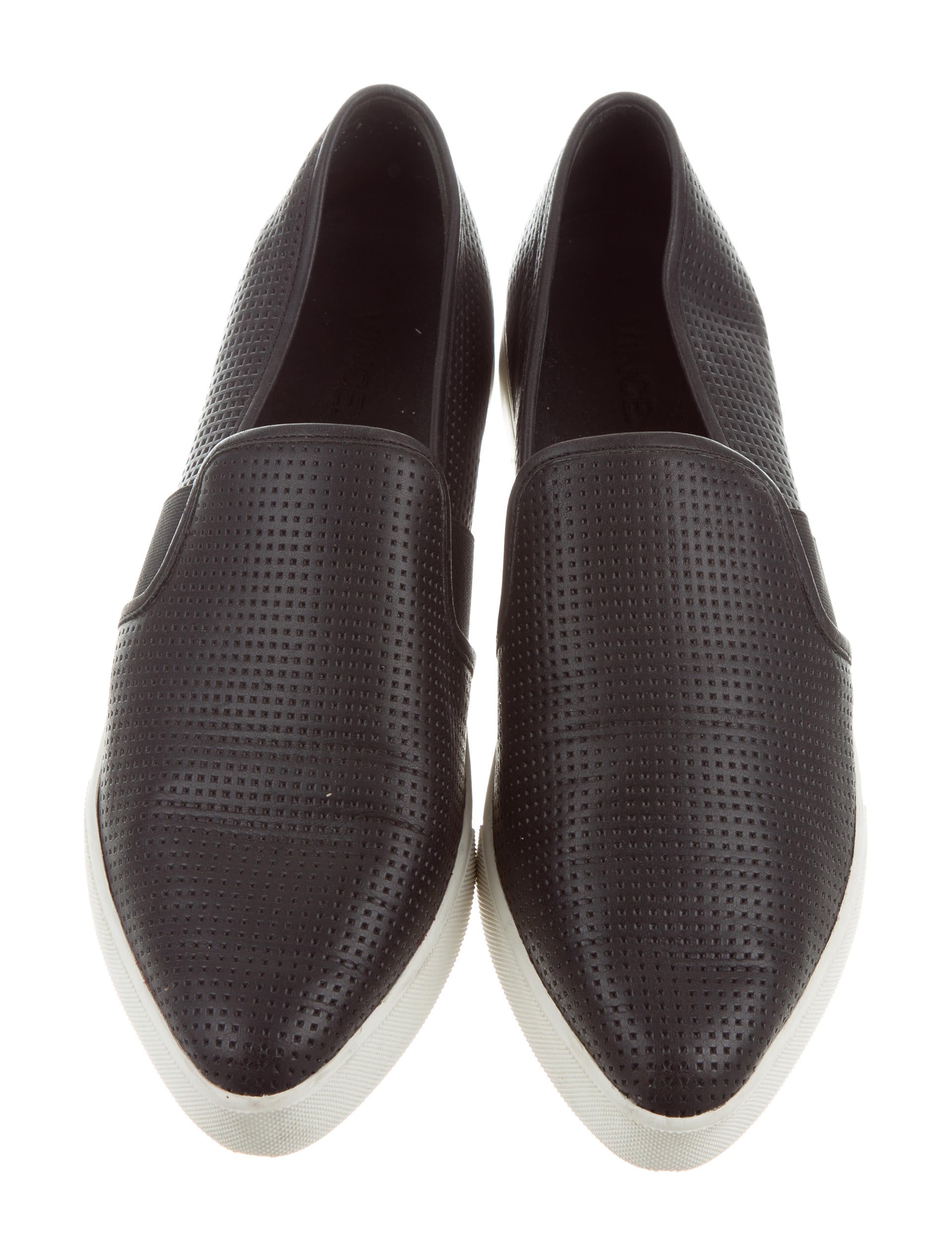 slip on sneakers with black soles