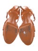 Yves Saint Laurent Patent Leather T-Strap Sandals