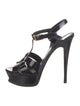 Yves Saint Laurent Patent Leather T-Strap Pumps