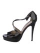 Yves Saint Laurent Patent Leather T-Strap Pumps