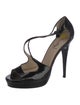 Yves Saint Laurent Patent Leather T-Strap Pumps