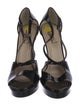 Yves Saint Laurent Patent Leather T-Strap Pumps