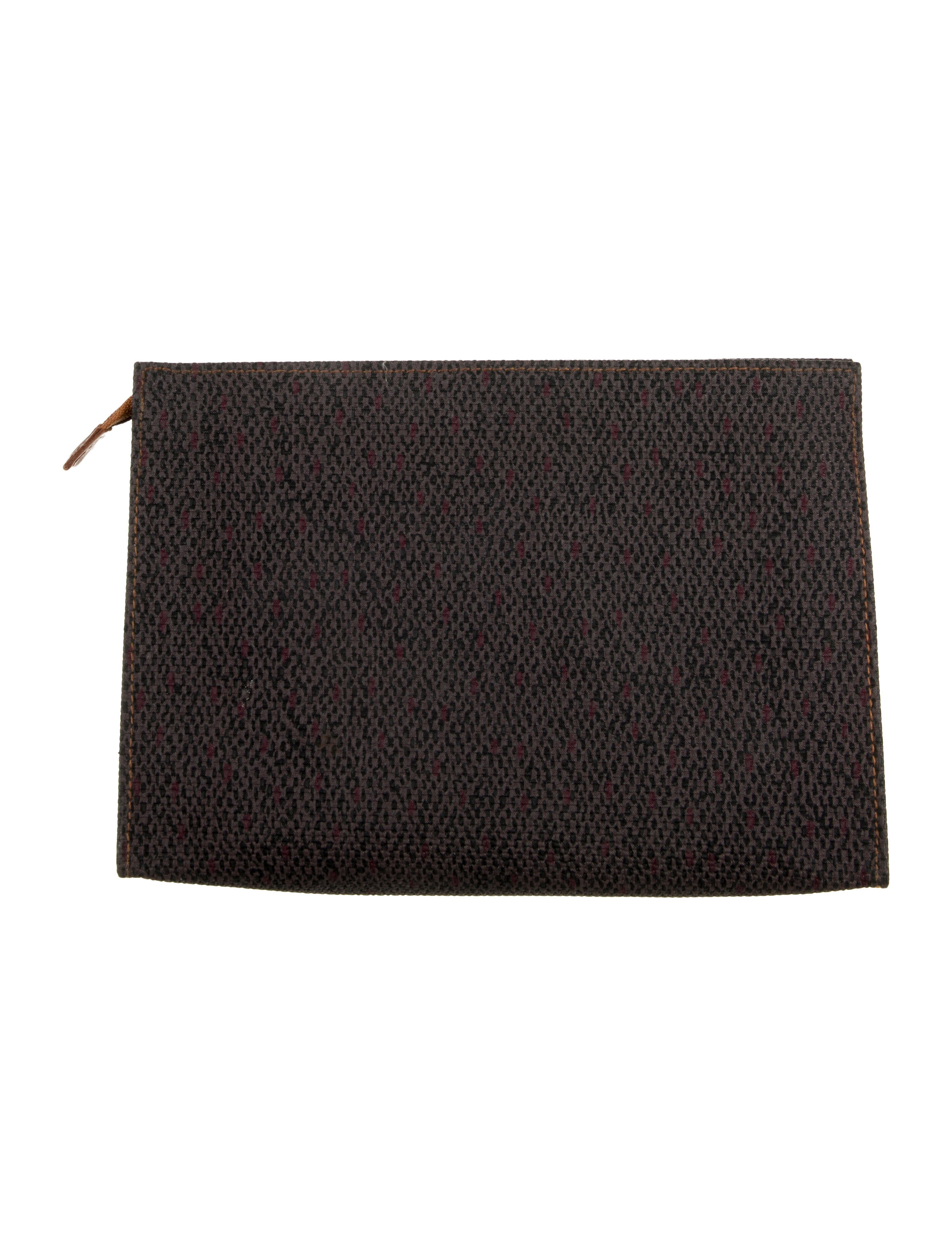 Yves Saint Laurent Womens knit cosmetic bag with zip closure.