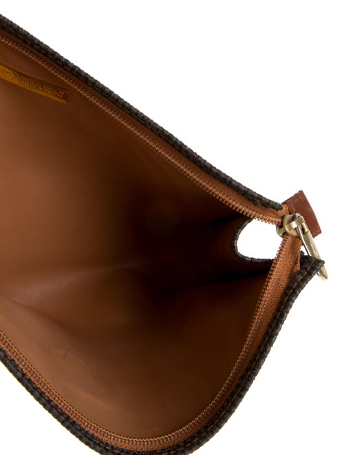 Yves Saint Laurent Womens knit cosmetic bag with zip closure.