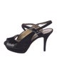 Yves Saint Laurent Patent Leather T-Strap Pumps