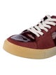 Yves Saint Laurent Patent Leather Embroidered Accent Sneakers